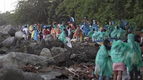 Coca-Cola associates join youth organization in Manila Bay wildlife reserve clean-up drive